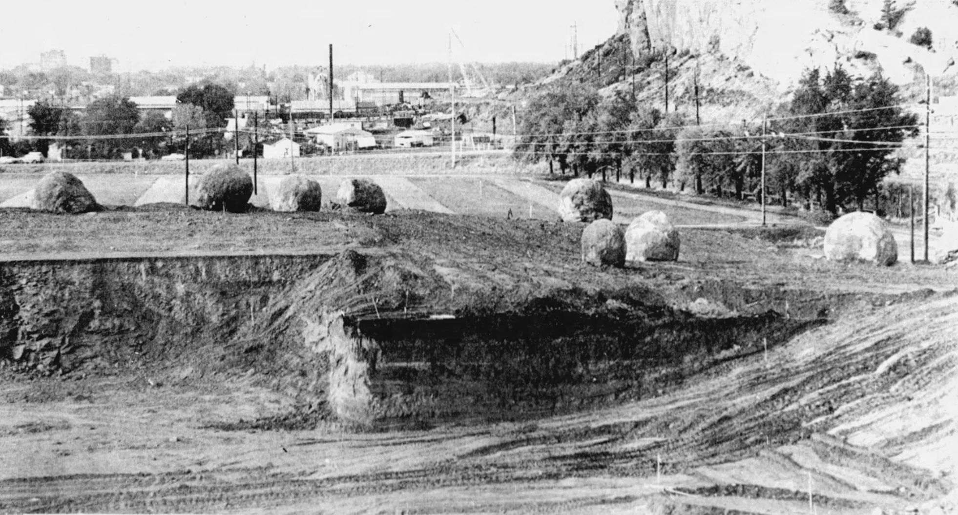 Boulders found during excavation for Metra, October 1973